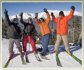 Skiers on summit of Wildcat